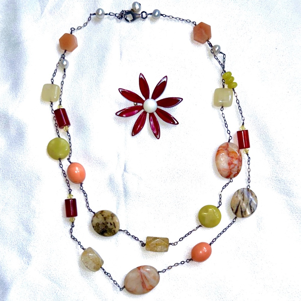 stone necklace and flower pin